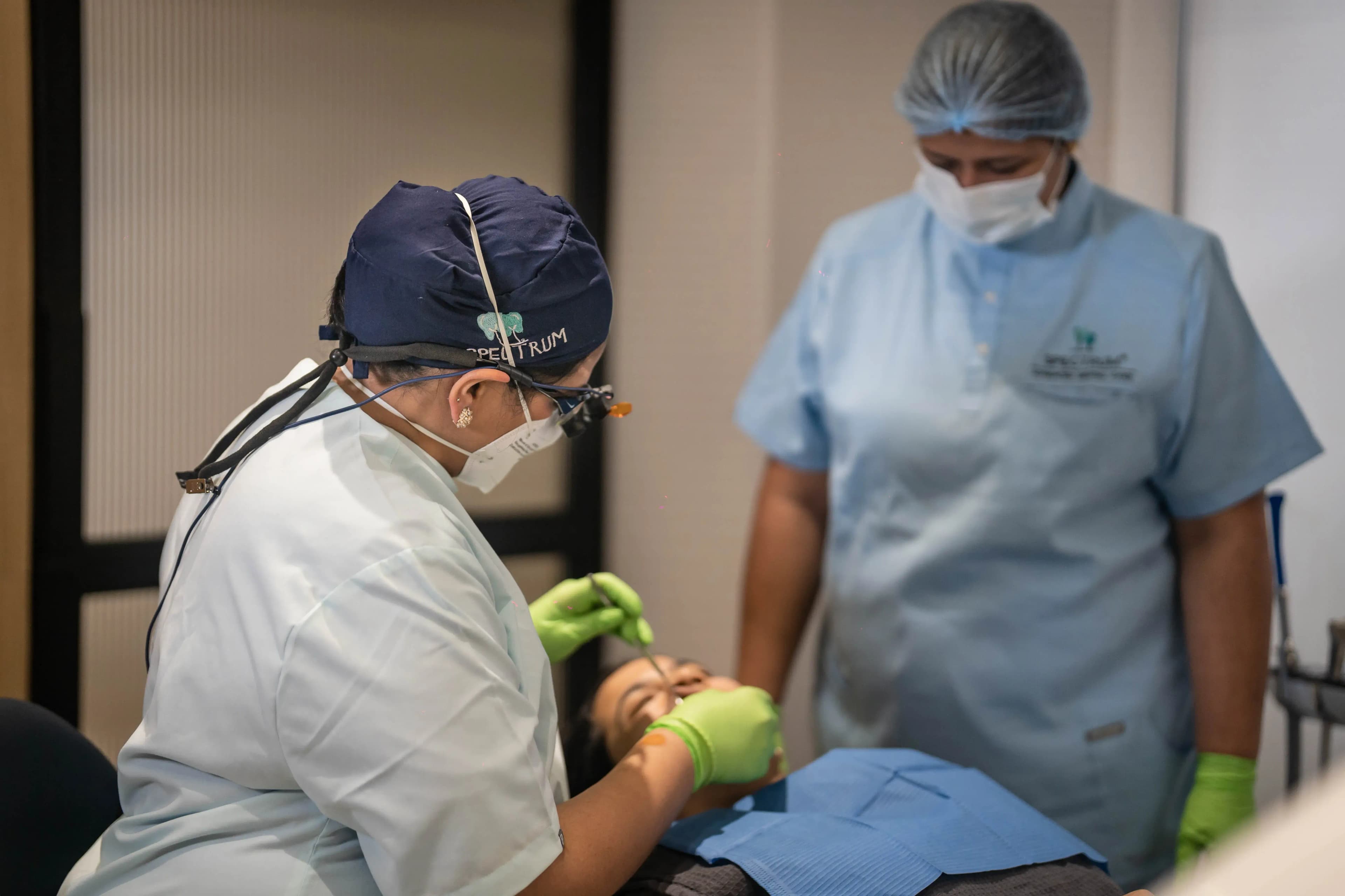 Dr. Radhika Performing Dental treatments at Spectrum Clinic in Khar West